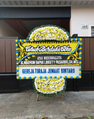 Papan Bunga Duka di Suro Makmur